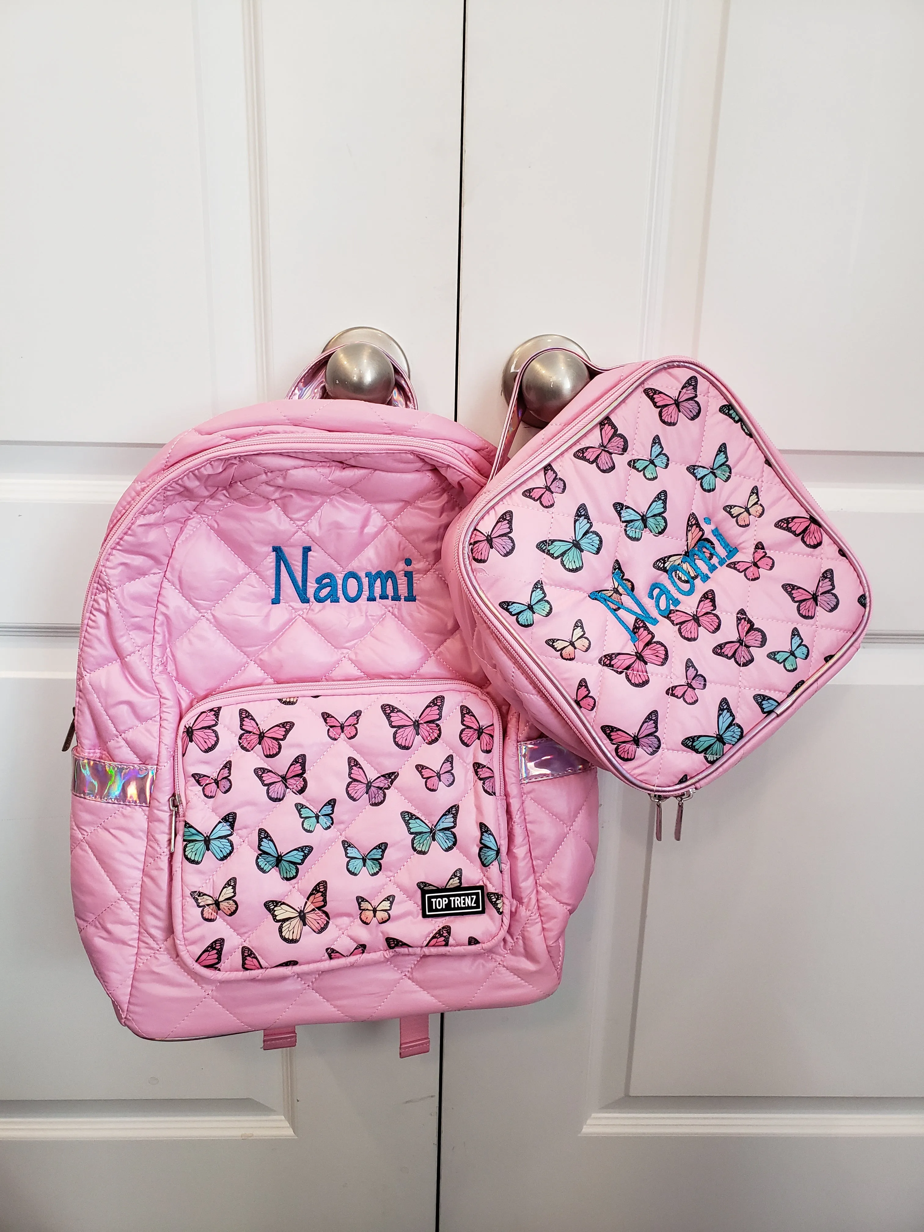 Puffer pink backpack with butterfly pocket