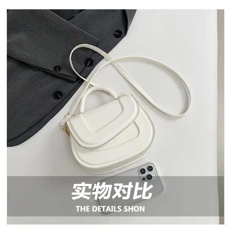 Single shoulder crossbody saddle bag