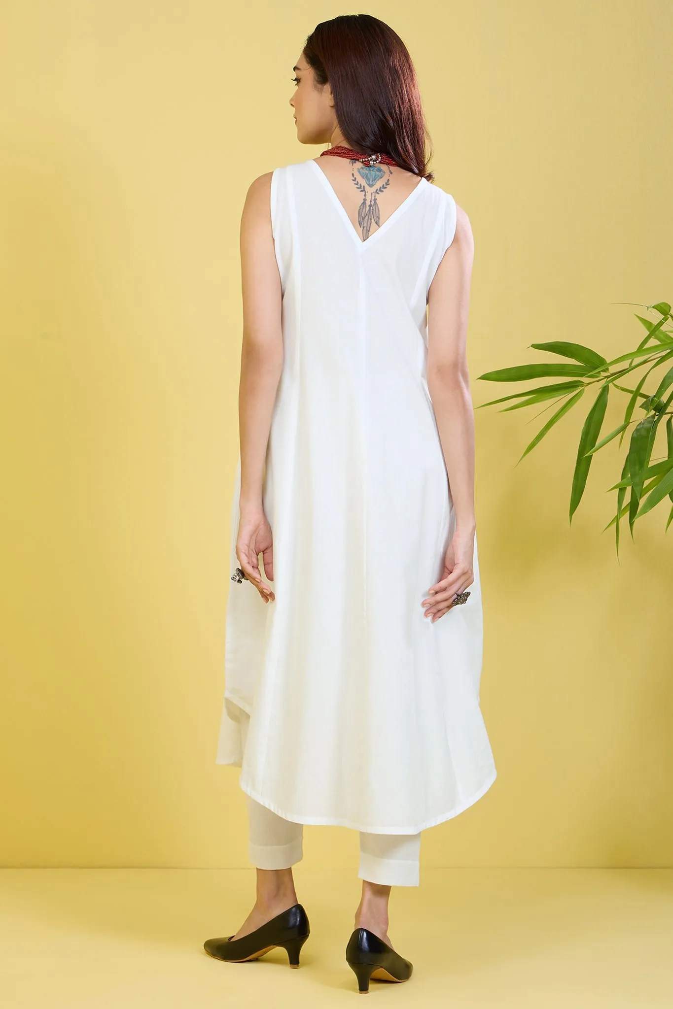 sleeveless white co-ord set with box pleat whispering white