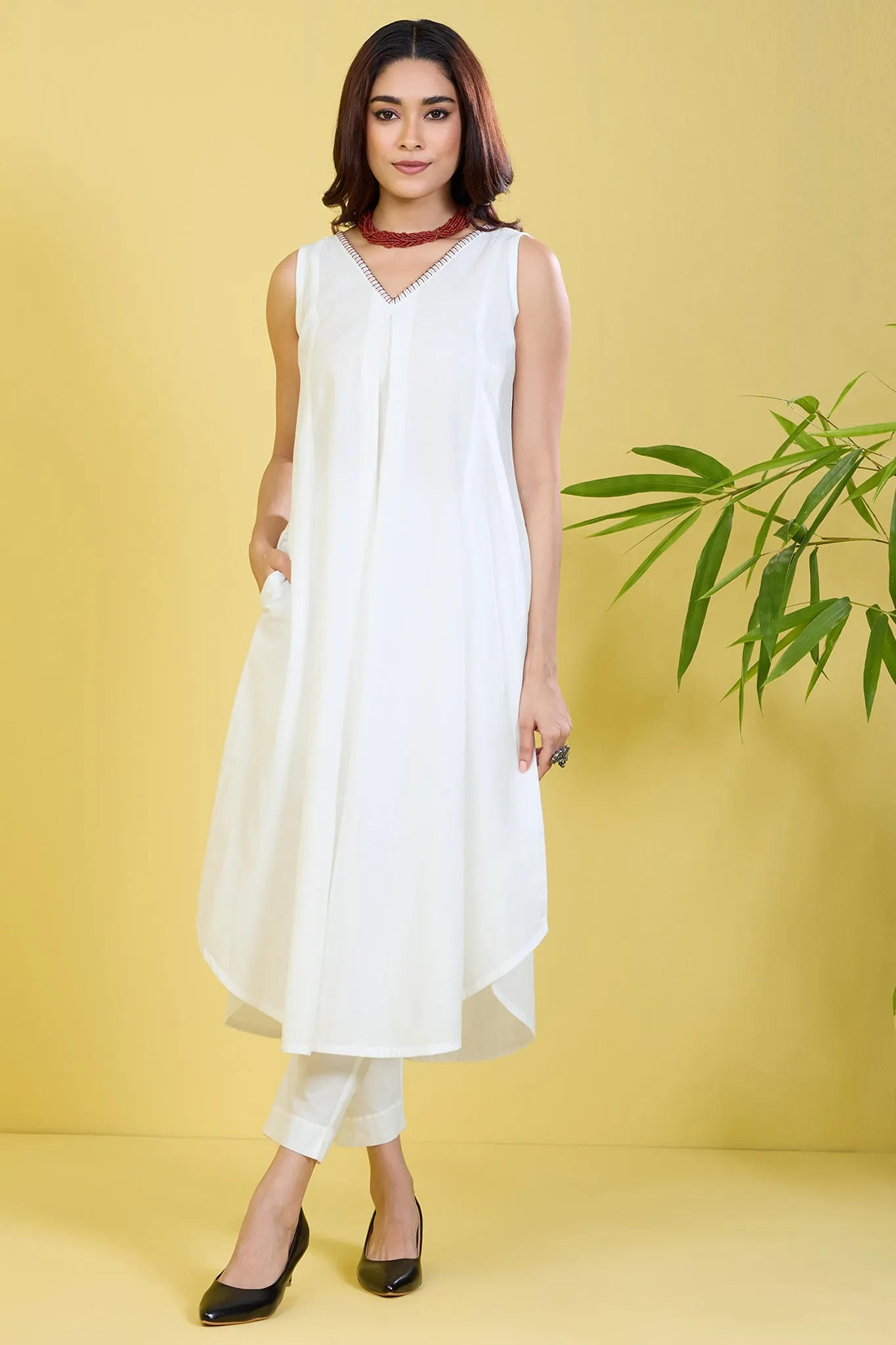 sleeveless white co-ord set with box pleat whispering white