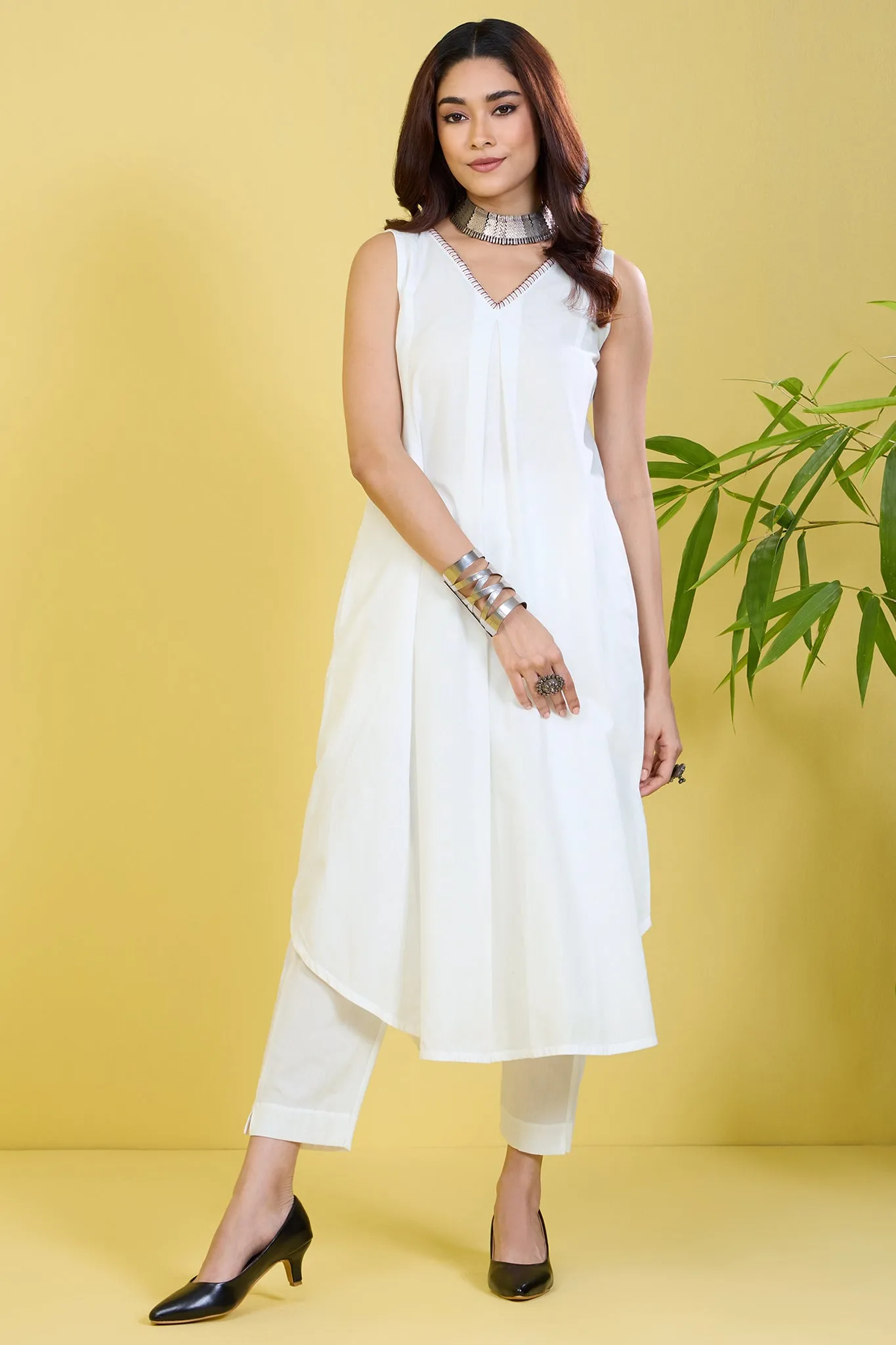 sleeveless white co-ord set with box pleat whispering white