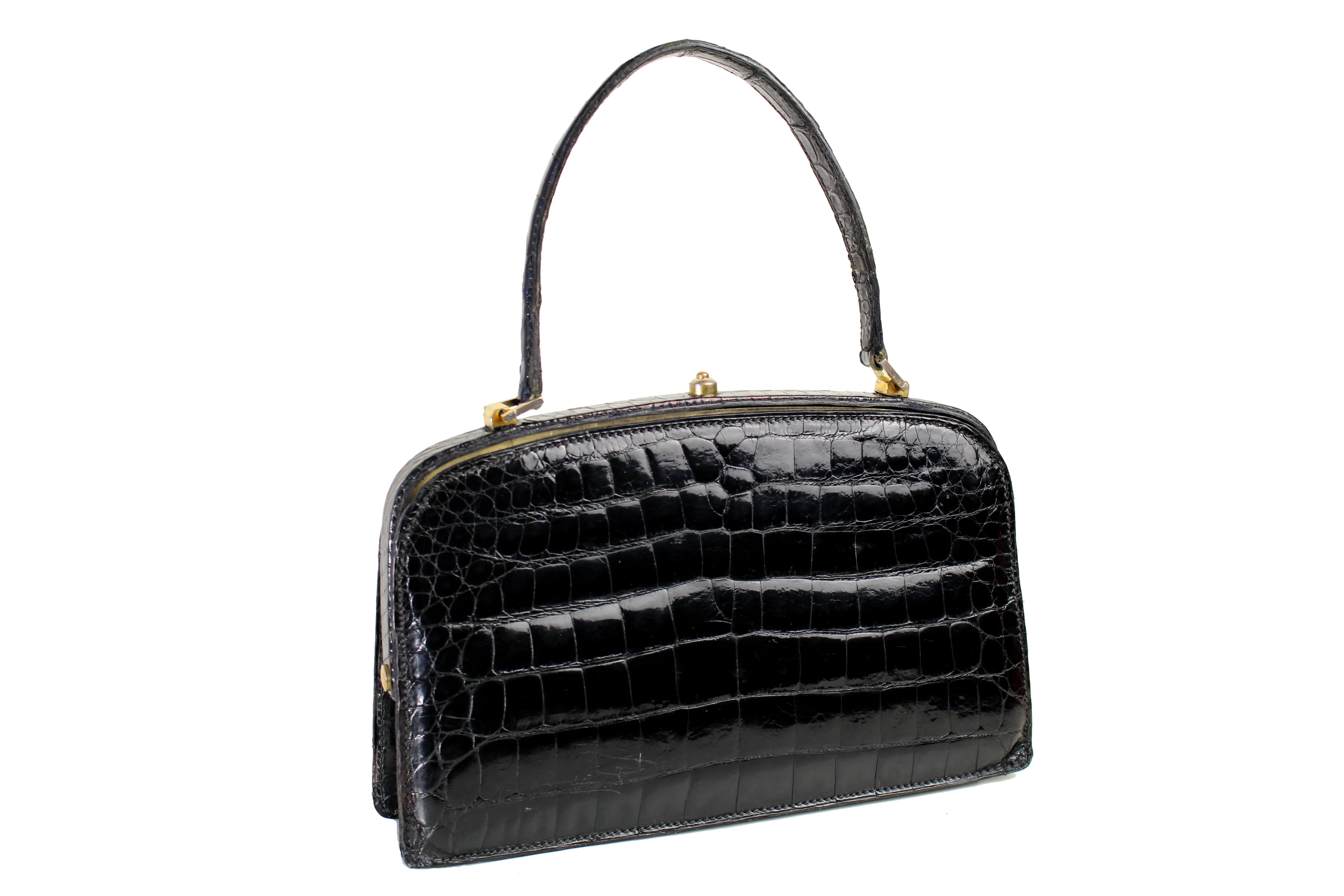 Small black crocodile skin handbag with skin lined frame