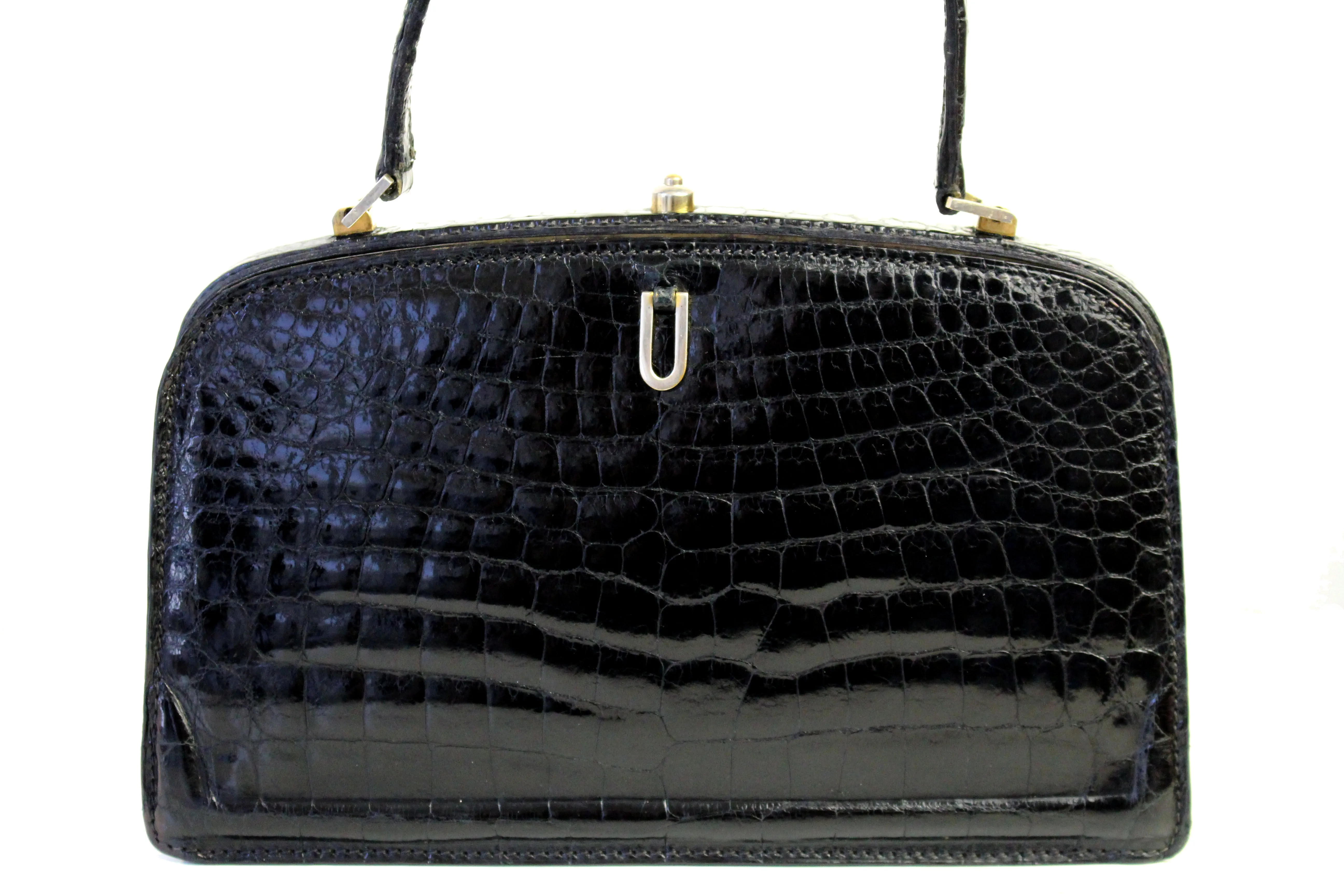 Small black crocodile skin handbag with skin lined frame